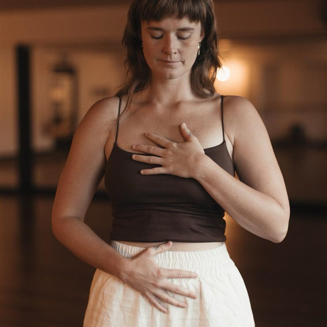 Yoga instructor doing breath work
